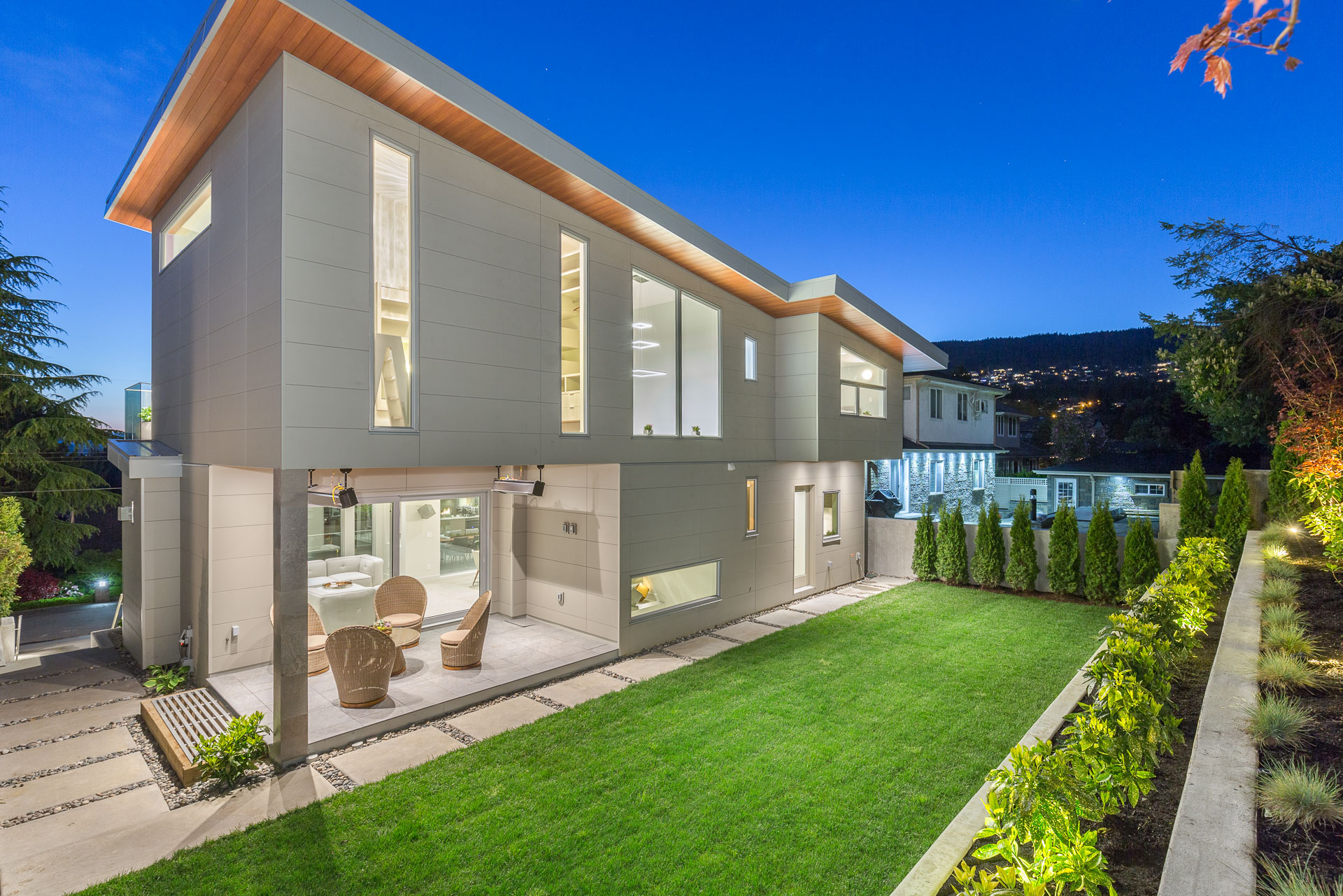 Canada house with a minimalist look, clean lines and beautiful landscaping and views across the skyline
