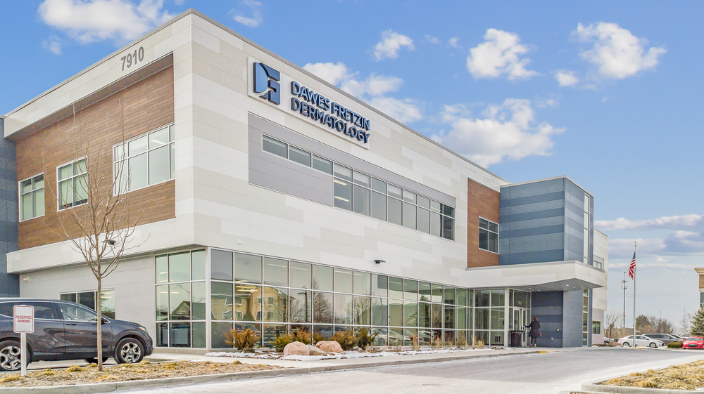 A shot of Dawes Fretzin Dermatology Building decorated in Nichiha&rsquo;s Ribbed Navy, RoughSawn in Tobacco color, and Illumination fiber cement cladding panels in Indianapolis.