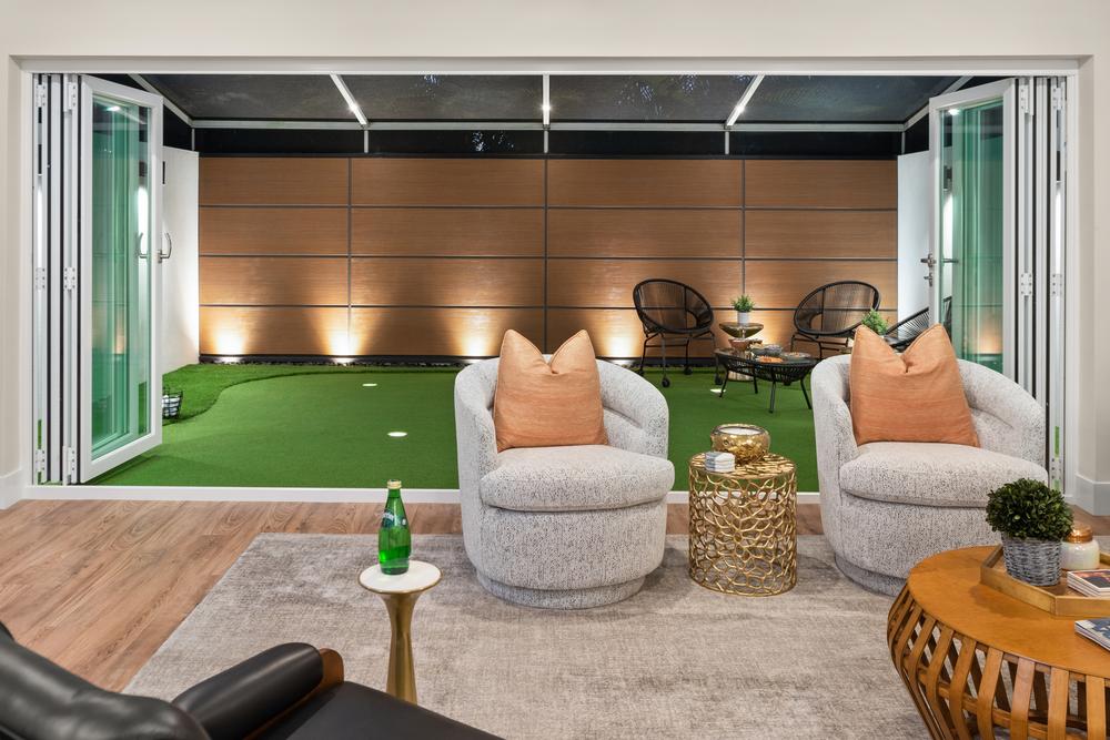 A backyard behind a living room utilizing Nichiha’s RiftSawn cladding.