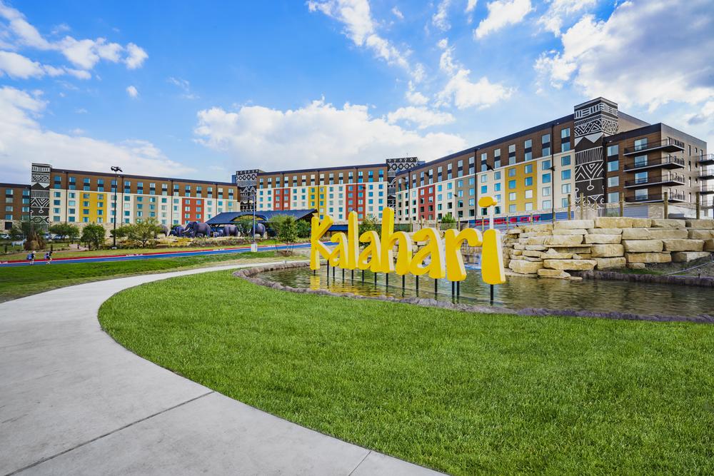 Kalahari resort sign in yellow in the Wisconsin Dells with buildings behind using Nichiha&rsquo;s modular construction installation.