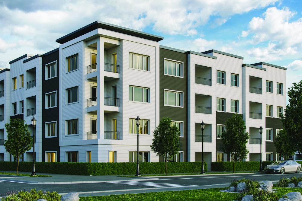 A street-view of a multi-family building with white and dark gray fiber cement siding.
