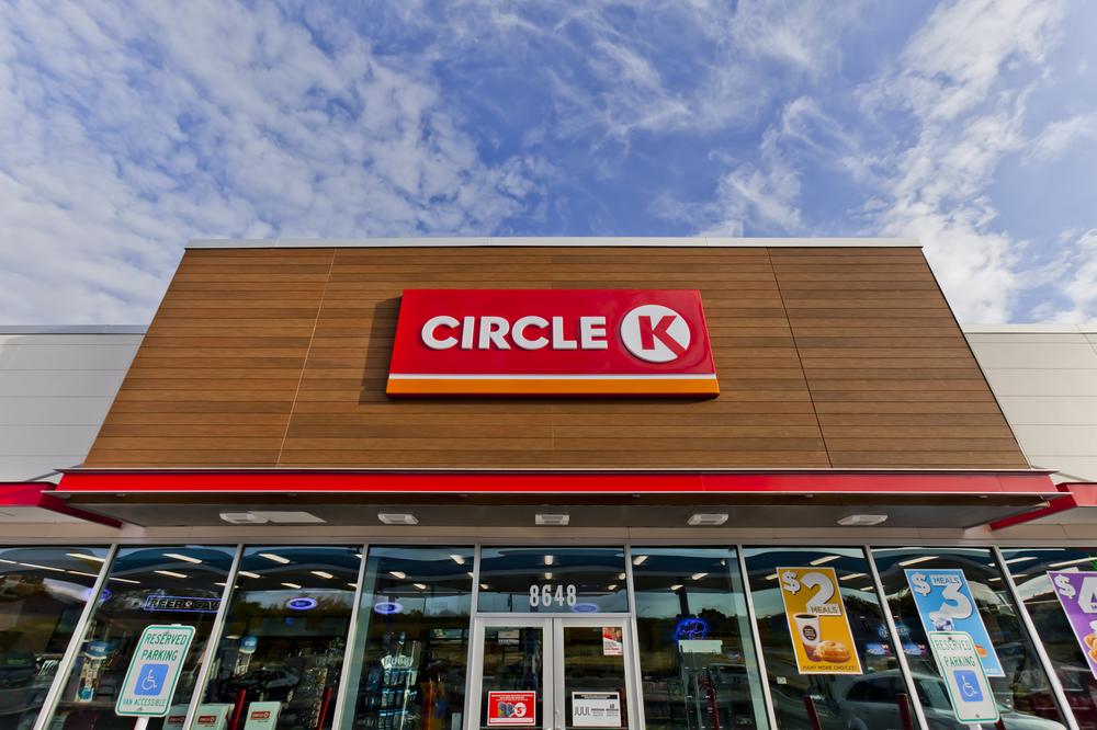 A close-up of the Circle K convenience store logo in red and white with Nichiha’s fiber cement cladding in brown behind it in San Antonio, Texas.