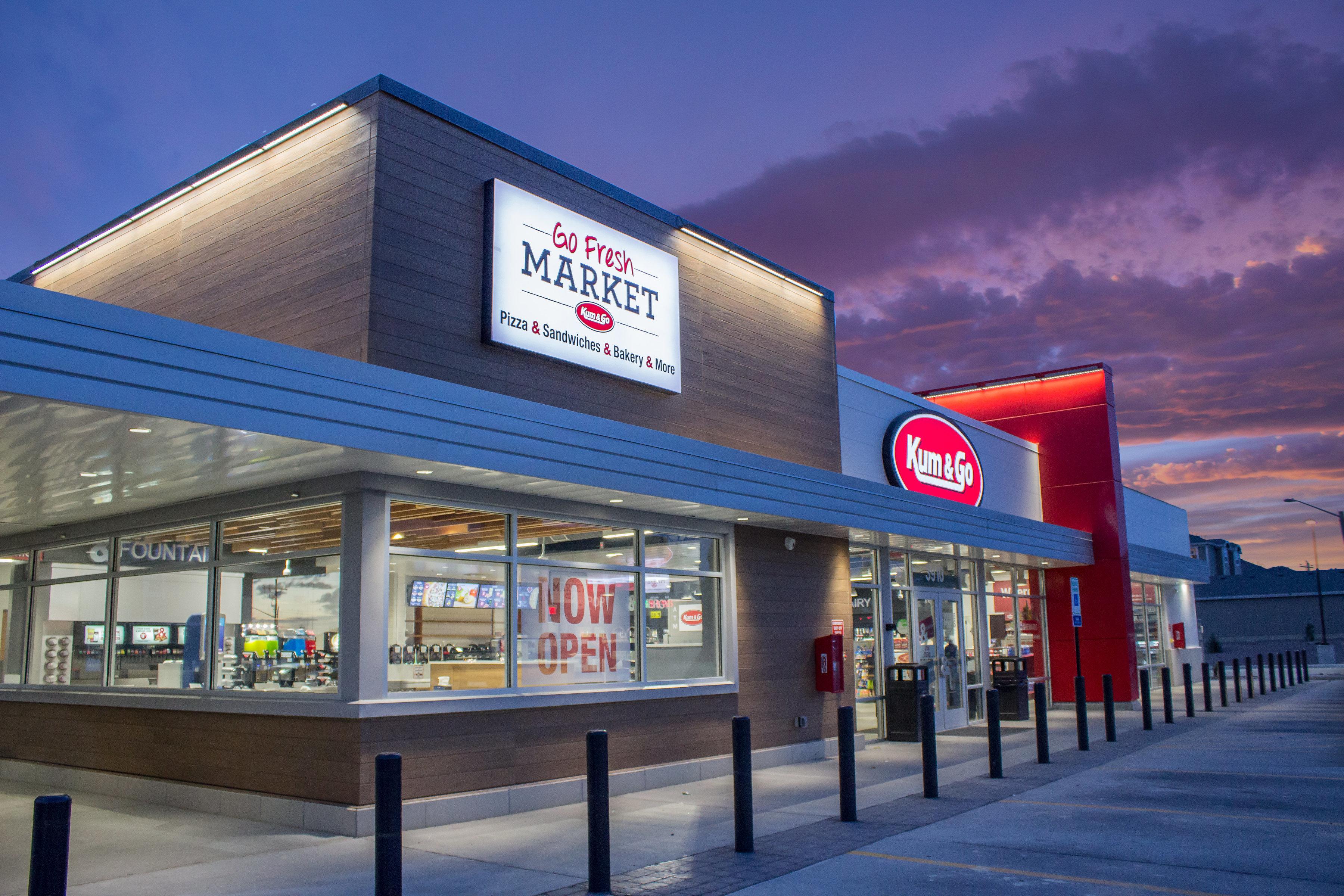 A Kum & Go convenience store at dusk decorated in Nichiha’s fiber cement cladding.