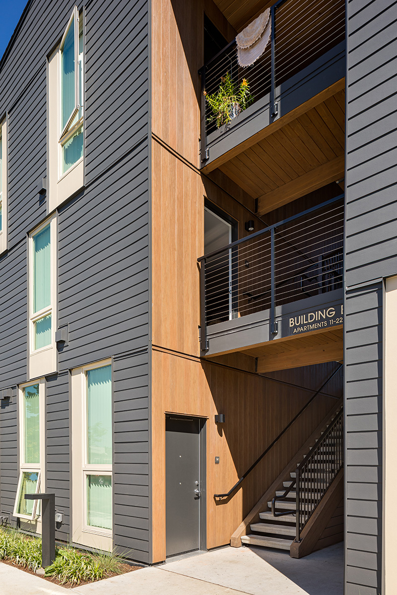 Close up of Elwood multifamily housing with VintageWood and gray siding