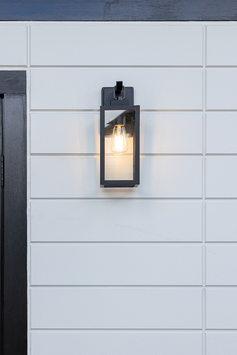 Close up of Novenary panel in Opal and modern sconce light fixture
