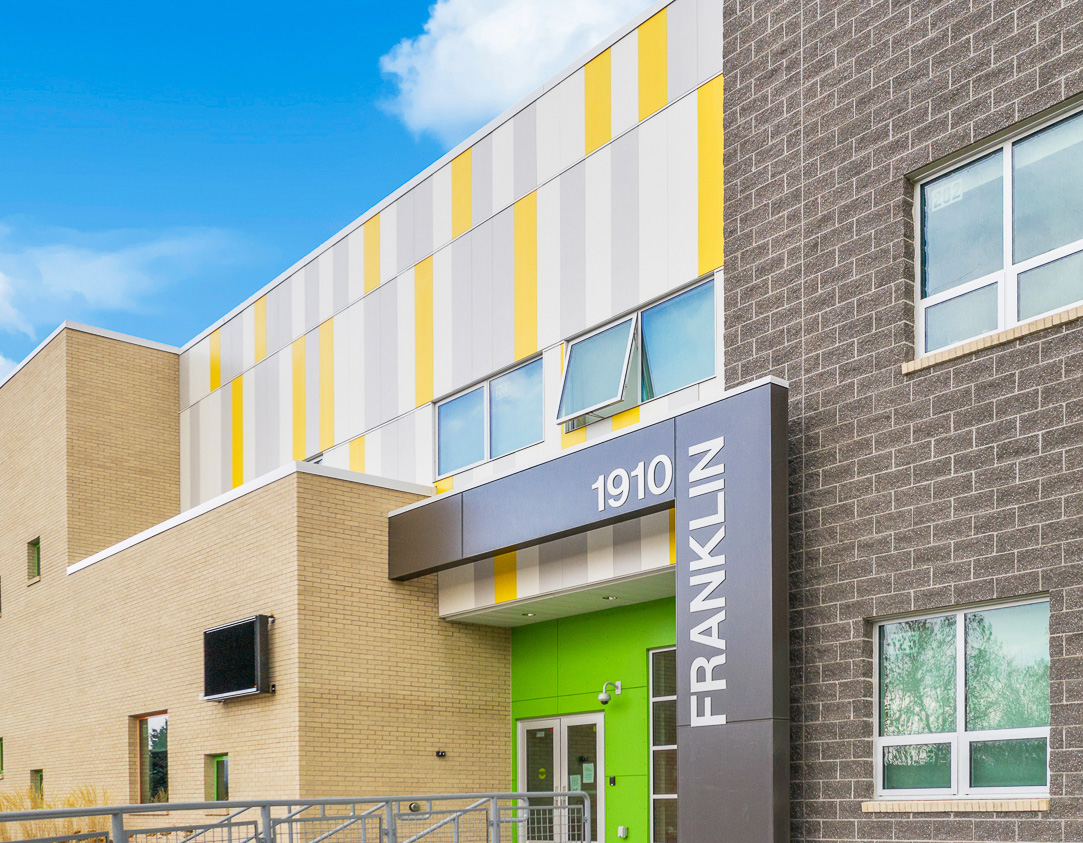 Front of Franklin School in Montana featuring yellow and gray Illumination panels