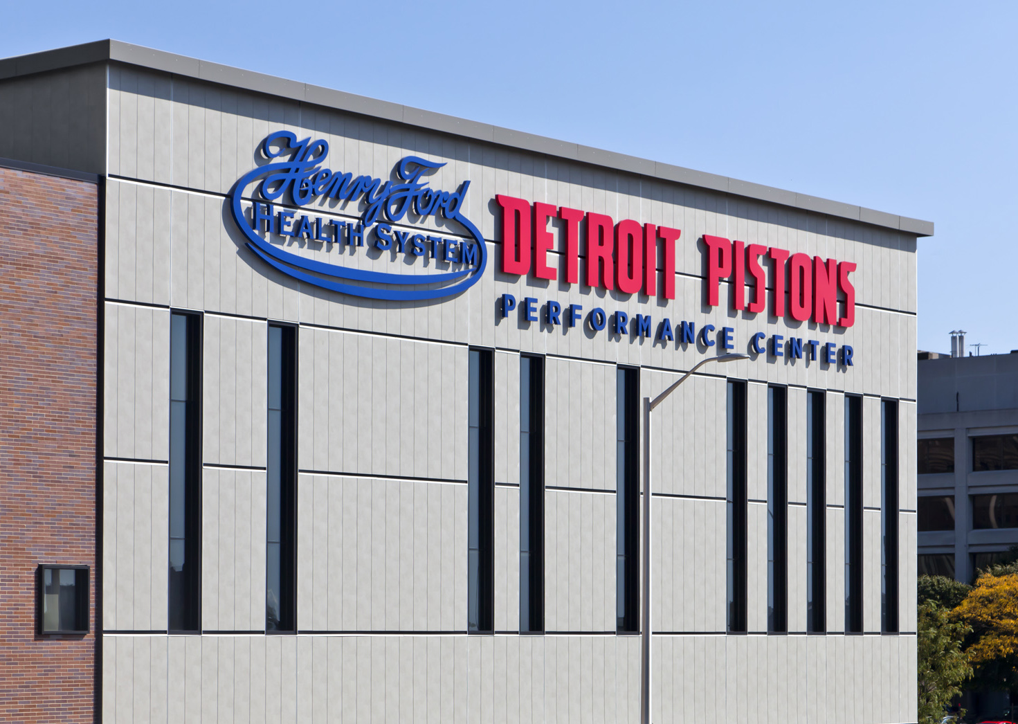 Front of the Detroit Pistons Performance Center with gray IndustrialBlock fiber cement panels from Nichiha