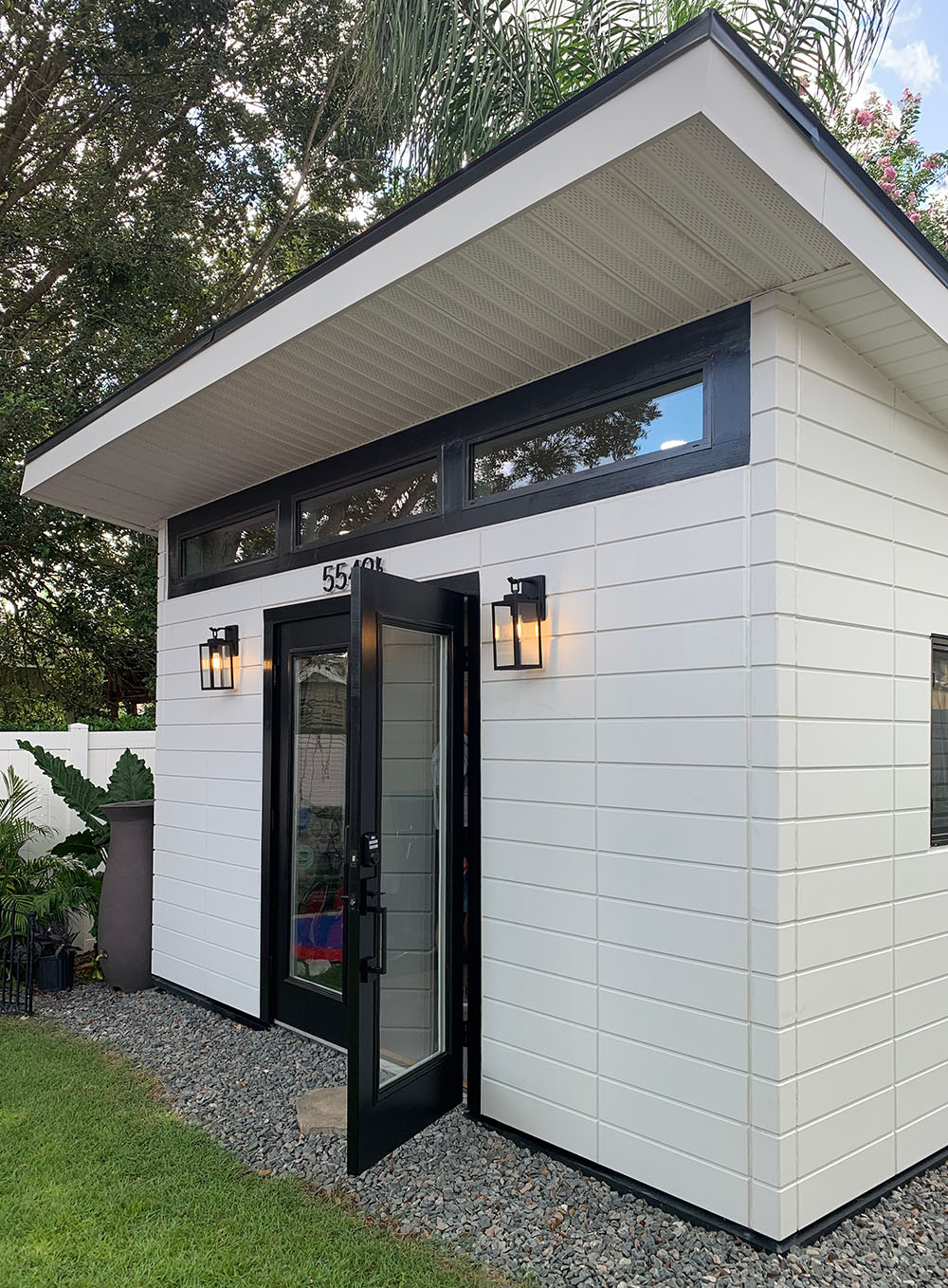 Image of a backyard studio fully wrapped in Novenary panels in Opal white
