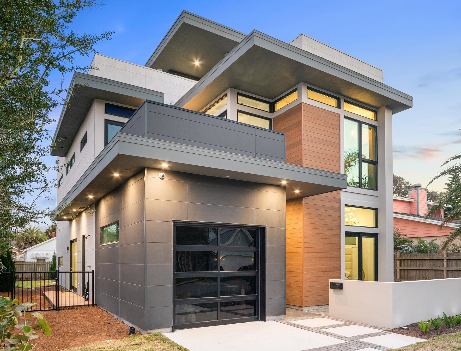Modern home in Jacksonville Beach Florida featuring Nichiha TuffBlock and VintageWood panels at dusk