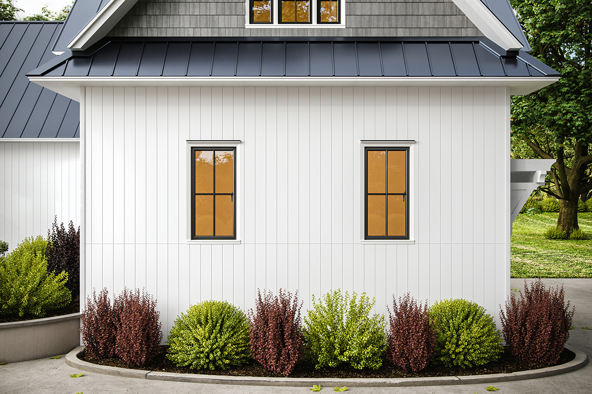 Close up of traditional custom home with Latura V-Groove installed vertically in white