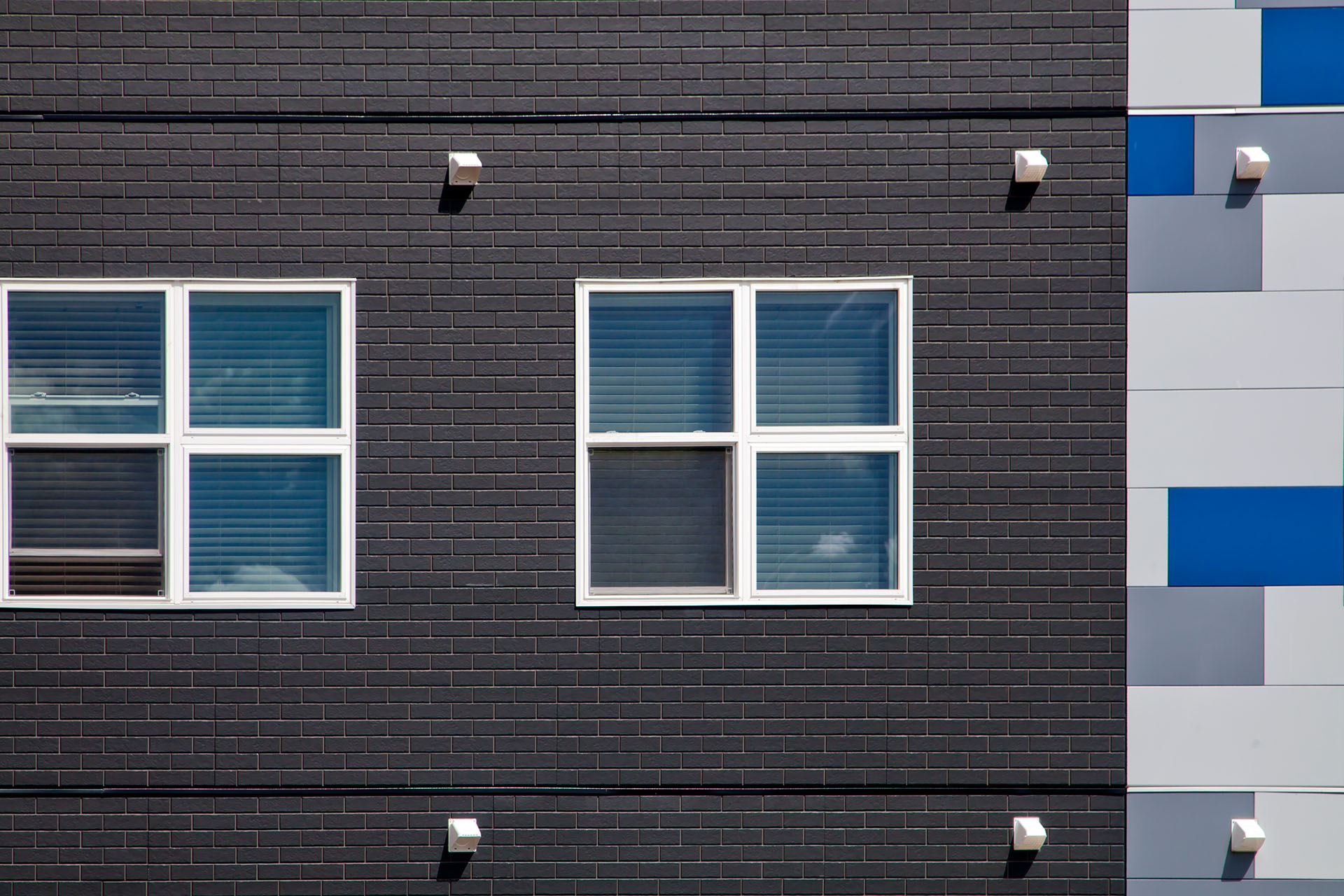 Side view of Nichiha's ModernBrick fiber cement panel with a modern look