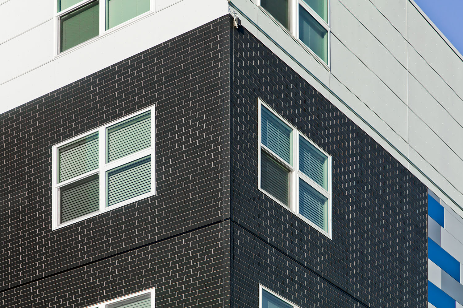 Corner angle of commercial building with fiber cement modern brick from Nichiha
